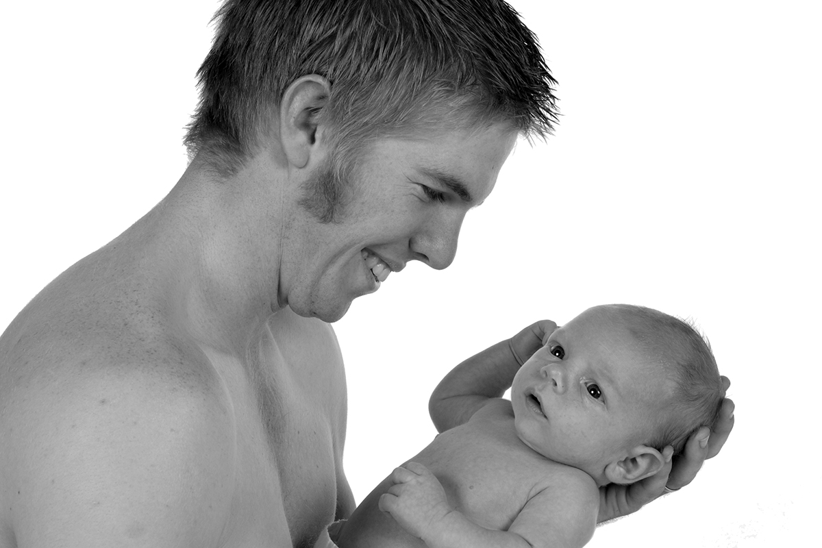 black and white photo of dad and baby