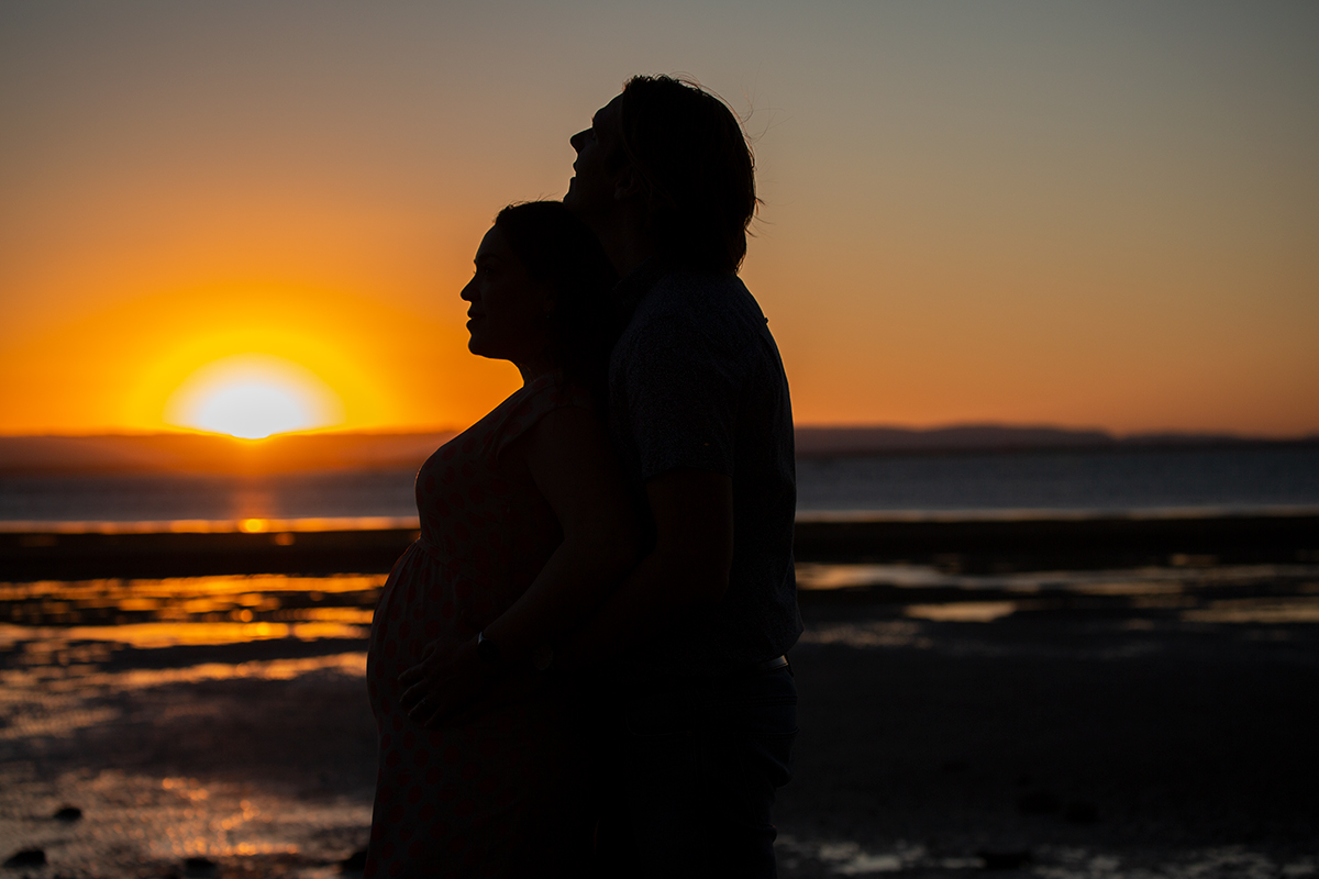 photo of couple at sunset
