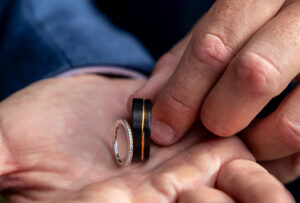 wedding rings in palm of hand