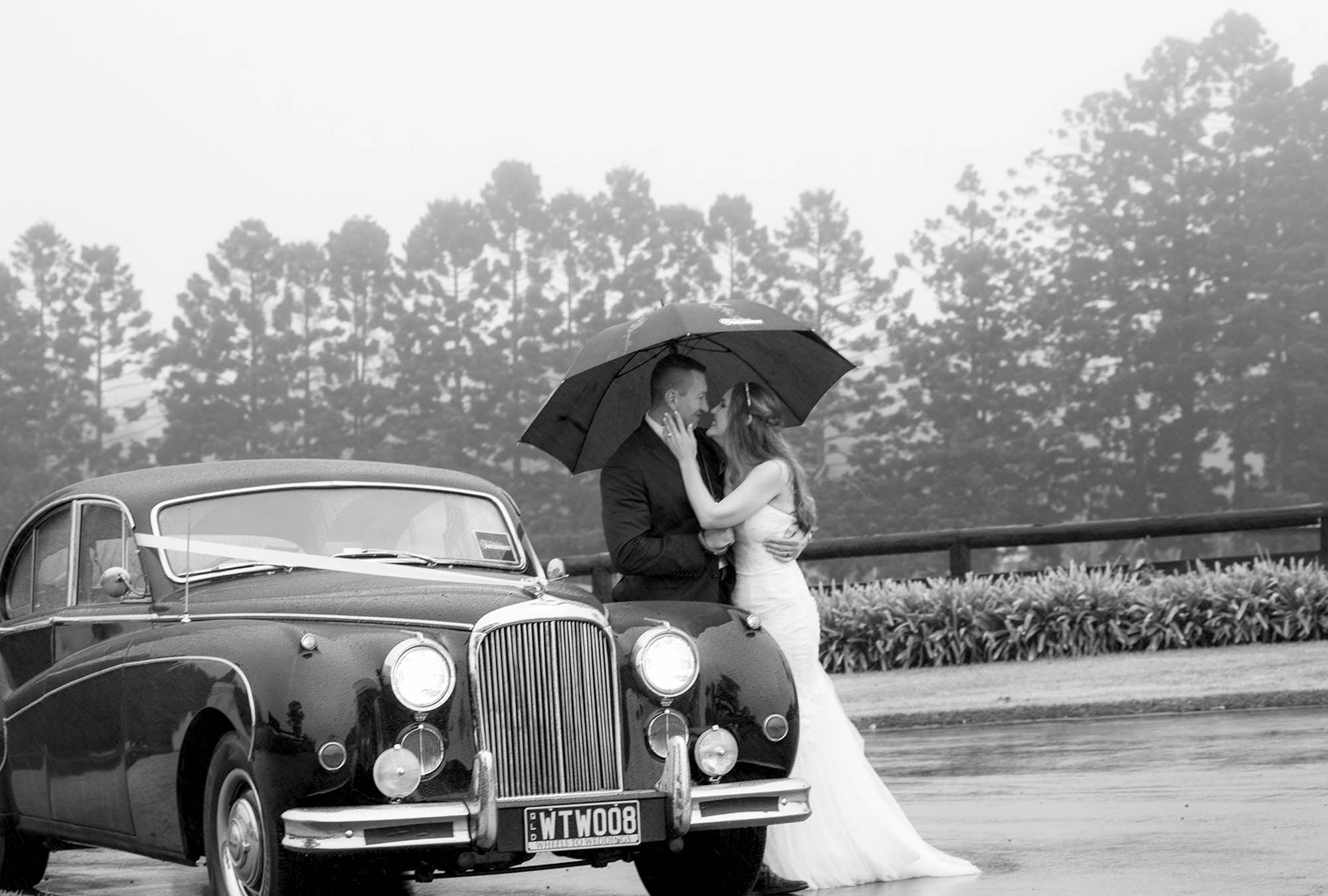 Black-white-photo-bridal-couple-jaguar-car-Malenyweddingphotography Black and white phot0 bridal couple jaguar car