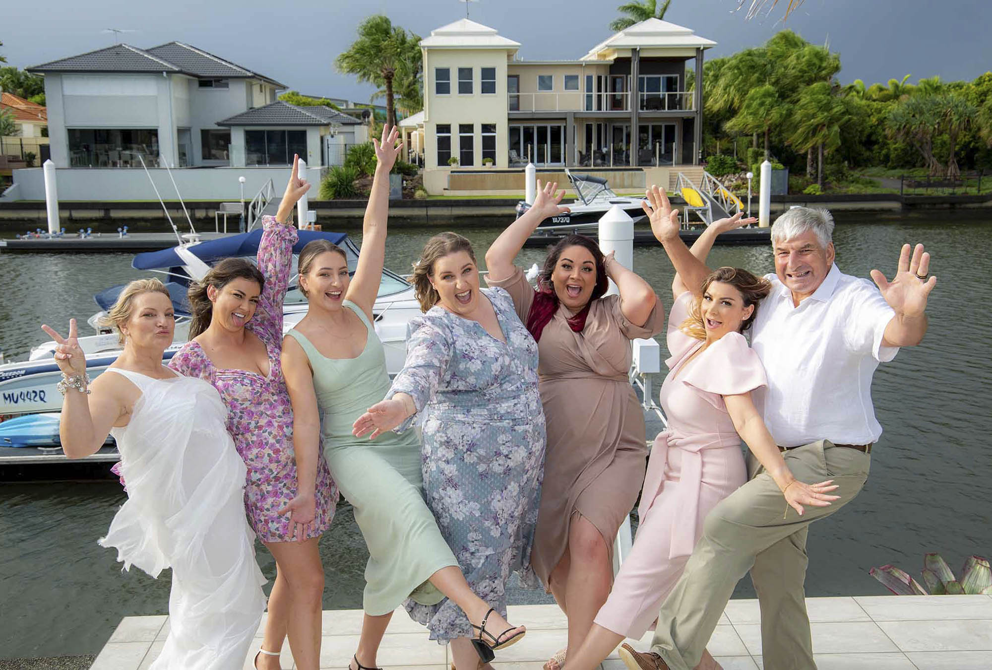 bridal-couple-wedding-friends-Malenyweddingphotography bride groom and friends at canal Maleny wedding photography
